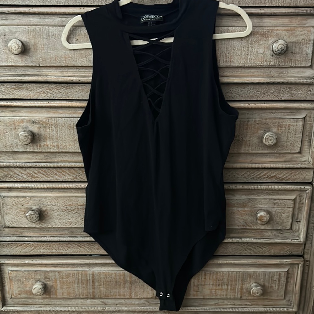 FOREVER 21+ Black body suit with neck embellishment.